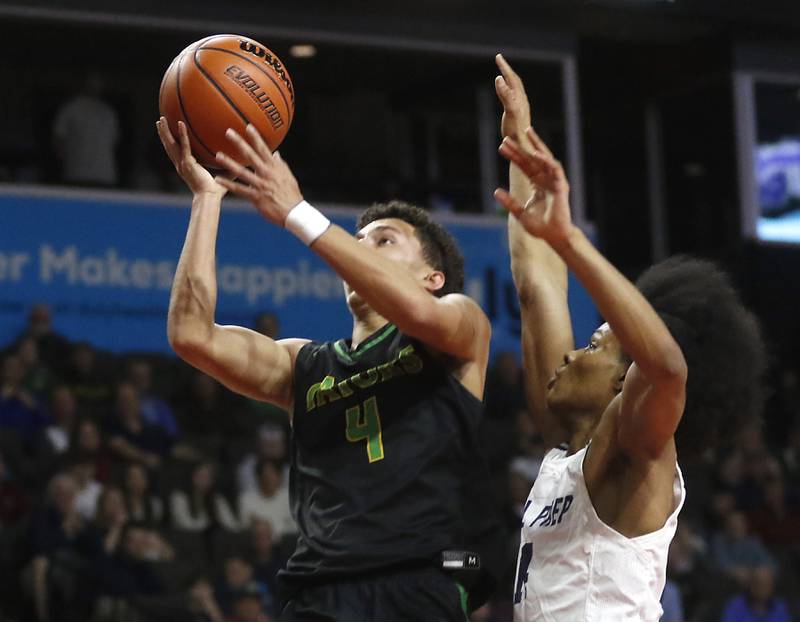 Crystal Lake South's AJ Demirov drives to the basket against DePaul College Prep's Robert Walls during the IHSA Class 3A Supersectional basketball game on Monday, March 4, 2024, at NOW Arena in Hoffman Estates.