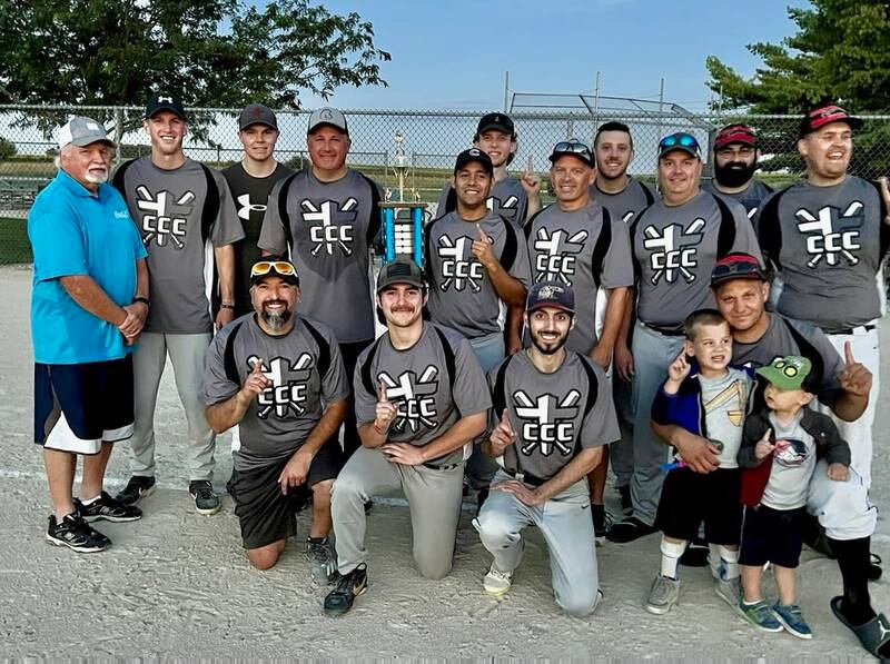 Christ Community, champions for 2022.  L-R Standing: Mike Maveus, Tyler Maveus, Michael Maveus, Jeff Maveus, Adrian Espinosa, Kevin Rink, Dan Rink, Matt Warren, Troy Dukes, Adam Dobson, Josh Helgeson.
L-R Kneeling: Lance Sandy, Bryce Sandy, Mark Skelley, Nathan Harbecke
