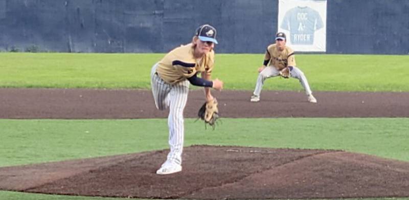 Marquette's Logan Nelson fires a pitch to a Hope Academy batter during Wednesday's 1A sectional opener in Elgin.