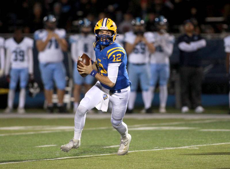 Lyons Township quarterback Dominic Pisciotti looks to throw the ball during the Class 8A second-round game against Downers Grove South on Friday, Nov. 8, 2024 at Lyons Township in Western Springs.