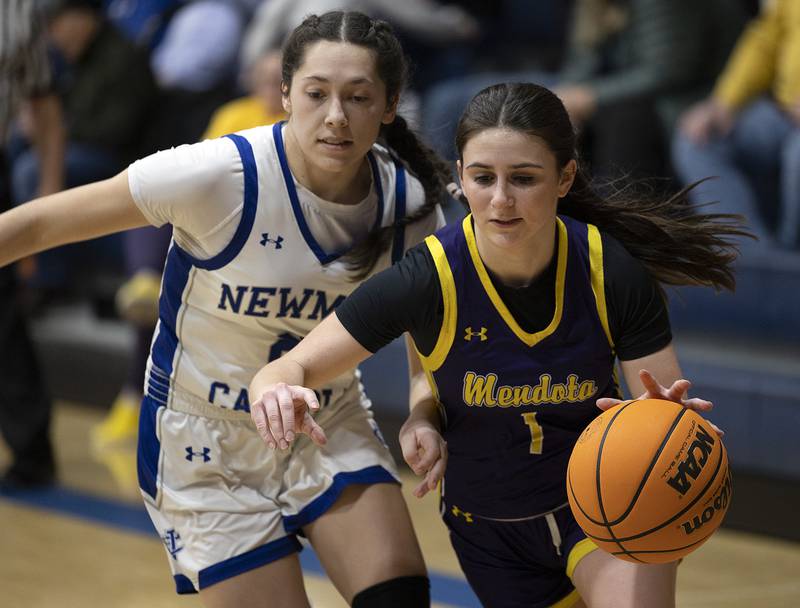 Mendota’s Ava Eddy drives to the hoop against Newman’s Anna Propheter Thursday, Jan. 23, 2025.