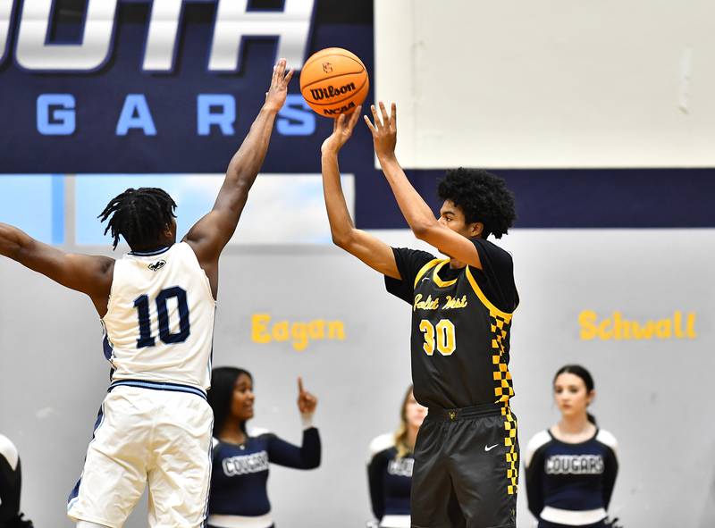 Joliet West's Joshua Calvert shoots a shot during the conference game against Plainfield South on Friday, DEC. 05, 2025, at Plainfield.