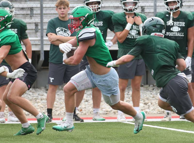 L-P's Easton Moriarity, carries the ball against St. Bede during a joint practice on Monday July 21, 2025 at Howard Fellows Stadium.