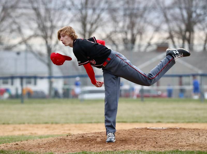 Hall sophomore Izzaq Zrust looses his cap on a pitch Monday at Princeton.