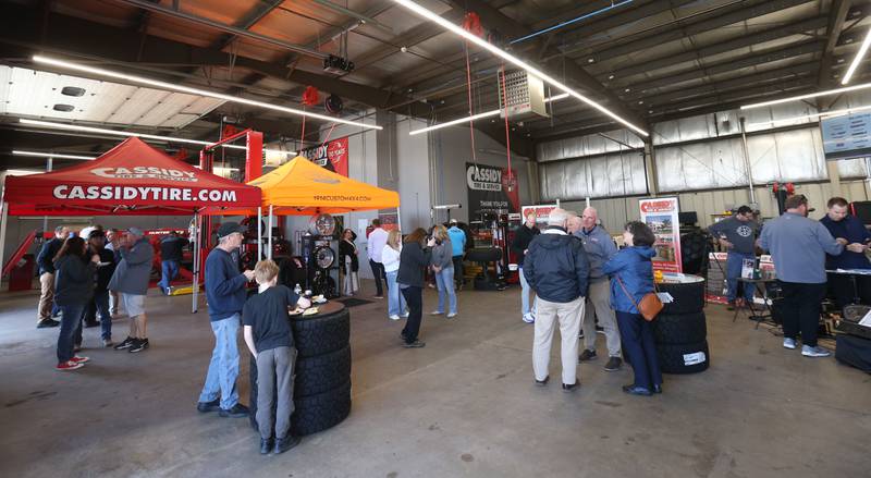 People tour the new Cassidy Tire open house on Saturday April 26, 2025 in Peru. The new location is located at 1414 38th Street in Peru. The event had giveaways, food truck and much more.