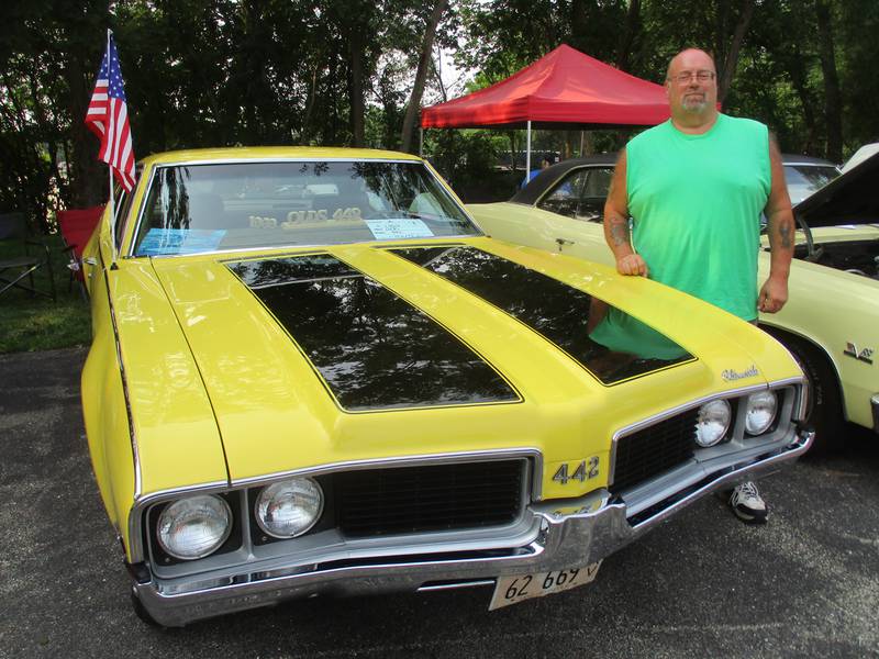 Mike Tripp of Plano displays his 1969 Oldsmobile 442 at the Plano American Legion Post 395 car show on July 16, 2023.