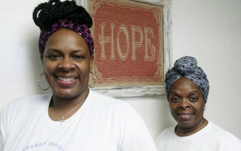 Yoko Tubbs, left, and her sister Felicia Holmes operate the Hope Food Pantry in Plano, serving Kendall County families in need. (Mark Foster -  mfoster@shawmedia.com)