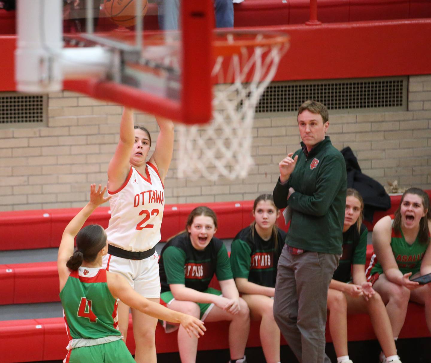 Ottawa's Marlie Orlandi shoots a jump shot over L-P's Brooklyn Ficek during the Class 3A Regional basketball game on Tuesday, Feb. 14, 2023 at Ottawa High School.