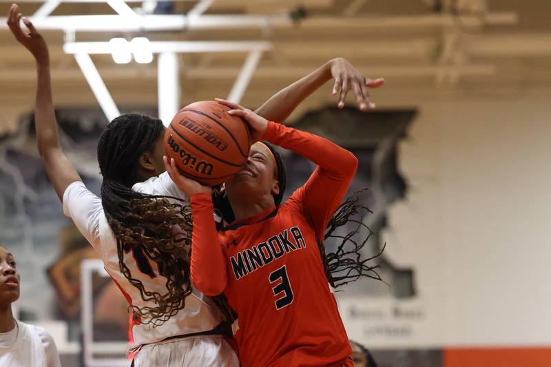 Minooka’s Kennedi Brass daws the foul going for the shot against Romeoville on Tuesday January 24th, 2023.