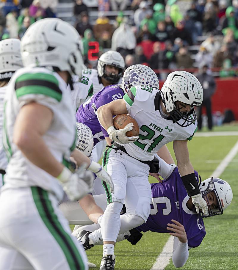 Athens’ Camren Bigard fights for yards against Wilmington Friday, Nov. 24, 2023 in the 2A state football championship game at Hancock Stadium in Normal.