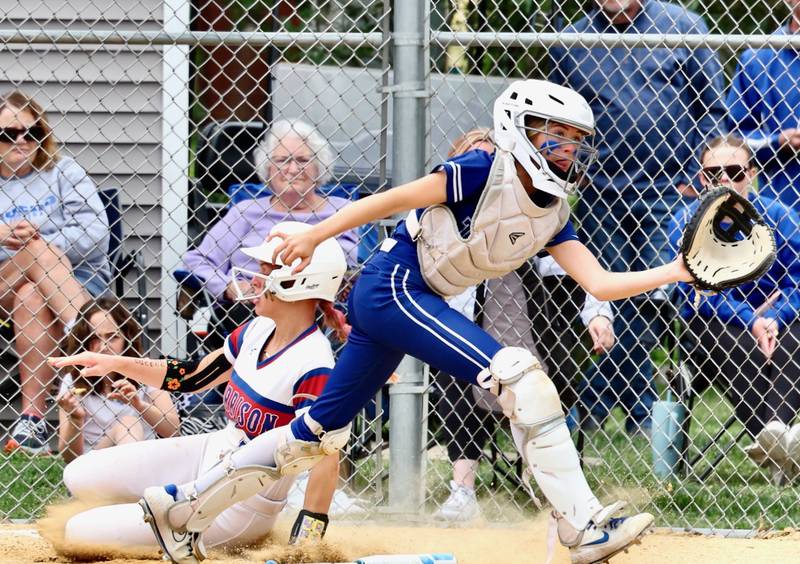 Princeton catcher Kiyrra Morris stretches for a throw to the plate in Saturday's regional championship. Morrison won 9-0.