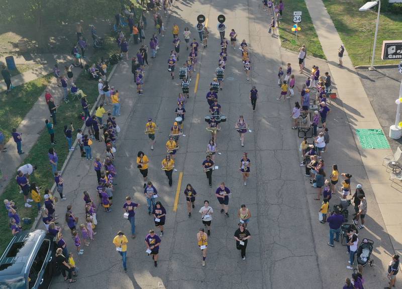 Members of the Mendota High School Band march down Washington Street during the homecoming parade on Friday, Oct. 3, 2025