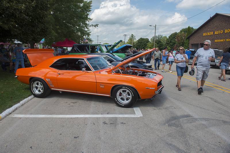 Colorful rides with gleaming chrome and big engines lined the streets of Amboy Sunday, Aug. 28, 2022 for their annual Depot Days car show. The show brings car owners and fans from all over the region to check out the mobile works of art and try they luck at the big 50/50 raffle pot.