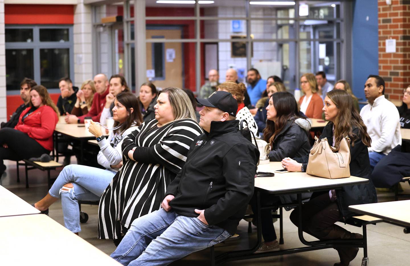 A group of about 30 attendees listen as Sycamore Community School District 427 Superintendent Steve Wilder speaks Monday, Jan. 9, 2023, during a public meeting hosted by the district at North Grove Elementary School. The forum was held to get staff and community feedback on a plan that could change the district boundaries causing some students to have to switch elementary schools inside the district as early as next year.