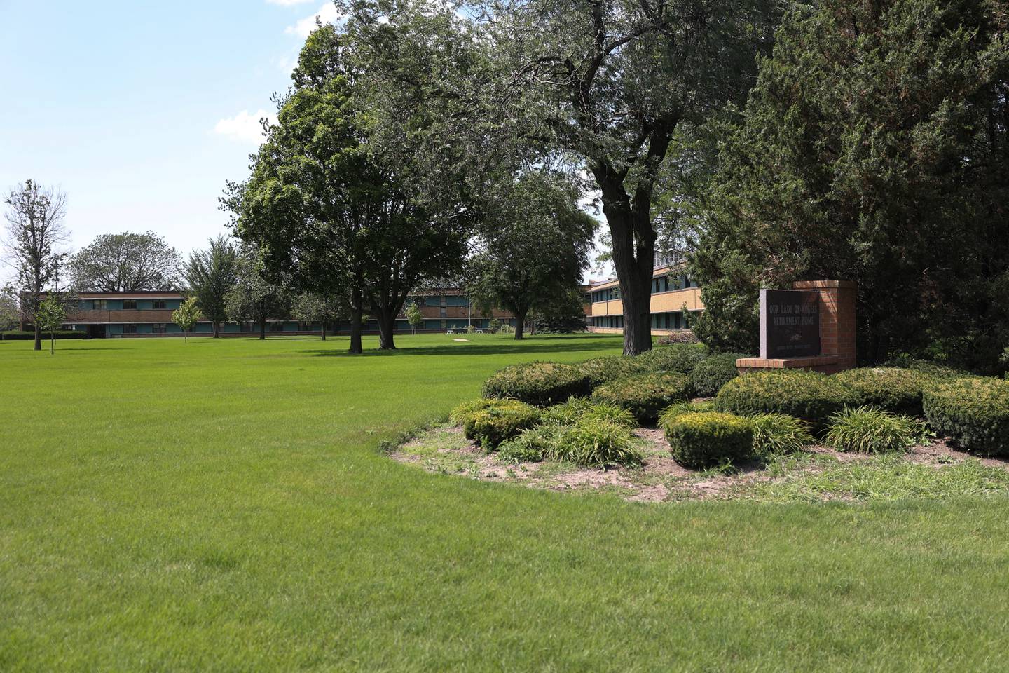 Our Lady of Angels is schedule to be demolished. Joliet Catholic Academy, seen in the background, is interested in purchasing neighboring Our Lady of Angels to expand the campus.