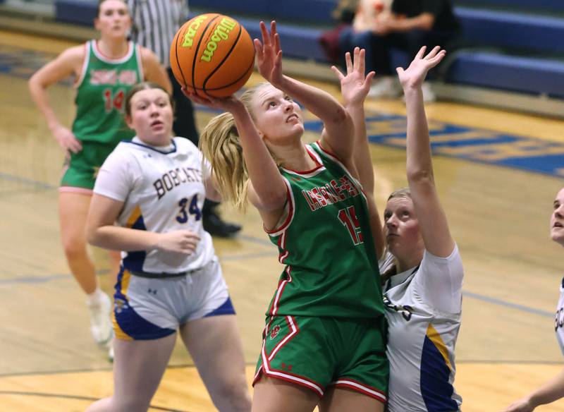 La Salle-Peru's Margaret Boudreau shoots over a Somonauk-Leland defender during their game Thursday, Nov. 20, 2025, in the Tim Humes Breakout girls basketball tournament at Somonauk High School.