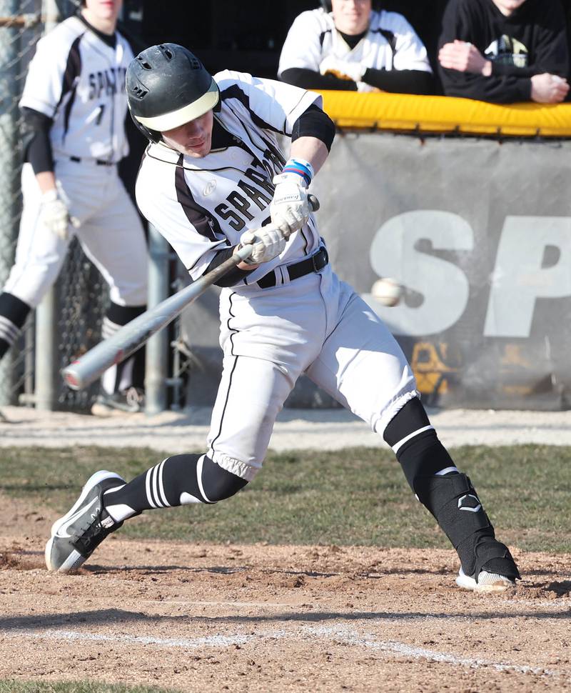Sycamore's Hunter Britz takes a cut during their game against Harlem Monday, March 27, 2023, at the Sycamore Community Park.