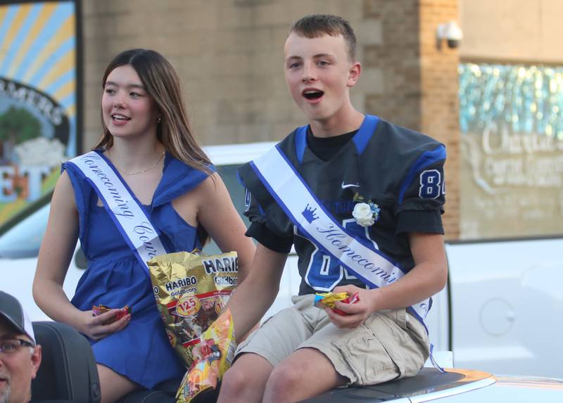 Princeton High School freshman homecoming court attendants Avaya Koning and Joel Odell ride during the Homecoming parade on Thursday, Oct. 3, 2024 downtown Princeton.