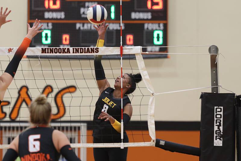 Joliet West’s Eden Eyassu goes up for the shot against Minooka on Thursday, Oct. 10, 2024 in Minooka.