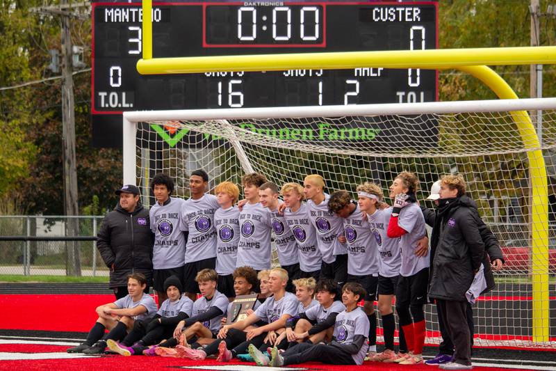 Manteno players pose for a photo following the Panthers' 3-0 victory over Reed-Custer in the Class 1A Momence Regional championship on Saturday, Oct. 25, 2025.