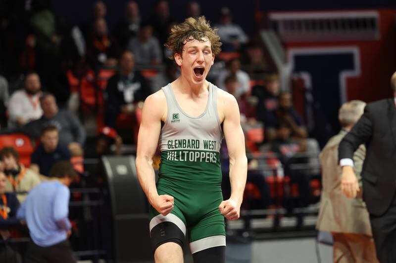 Glenbard West’s Collin Carrigan celebrates his win over Lyons’ Gunnar Garelli in the 165-pound Class 3A state championship match on Saturday, Feb. 17th, 2024 in Champaign.