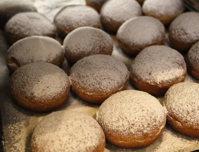 Plum paczki for sale Wednesday, Feb, 15, 2023, at Deli 4 You, at 1501 S. Randall Road in Algonquin. Area bakeries are prepping for the lead-up to Lent when paczki are traditionally eaten. Deli 4 You will make and sell around 30,000 paczki this week.