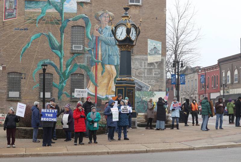 Protesters gathered Tuesday, Jan. 6, 2026, for a Venezuela Rapid Response Rally at Memorial Park on the corner of First Street and Lincoln Highway in DeKalb, to voice their opposition to President Donald Trump and the administrations recent actions in Venezuela.