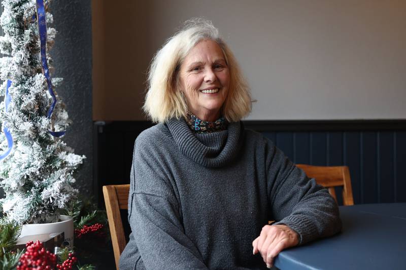 Meg Gillespie owner of Magpie's Joy of Eating poses for a photo at her new diner in Joliet.