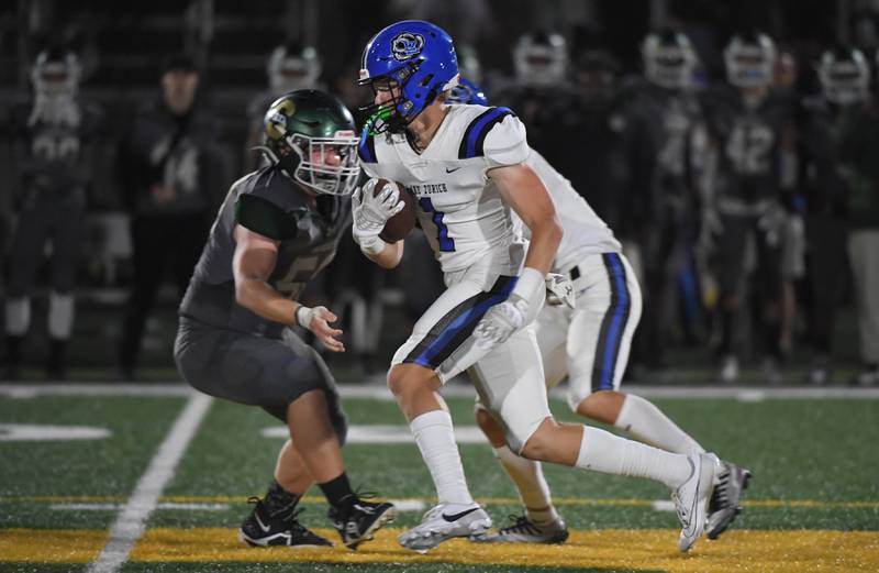 Lake Zurich’s Jackson Piggott runs against Stevenson in a football game in Lincolnshire on Friday, September 8, 2023.