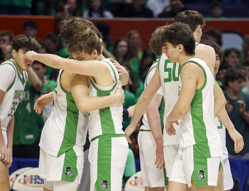 York players react after loosing to Marist in the IHSA Class 4A boys basketball state semifinal Friday, March 13, 2026 at the State Farm Center in Champaign.
