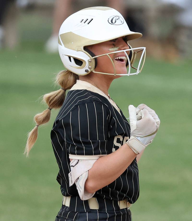 Sycamore's Addison McLaughlin celebrates after reaching second on a single and an error Tuesday, June 3, 2025 during their Class 3A sectional semifinal game against Crystal Lake Central at Sycamore High School.