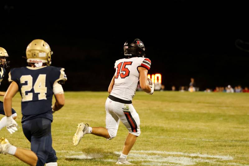 Mercer County #24 Tannen Whitehall tries to chase down Erie Prophetstown's #15 Evan Steimle as he charged down the field Friday night in Aledo. The Panthers beat their host team 43-15