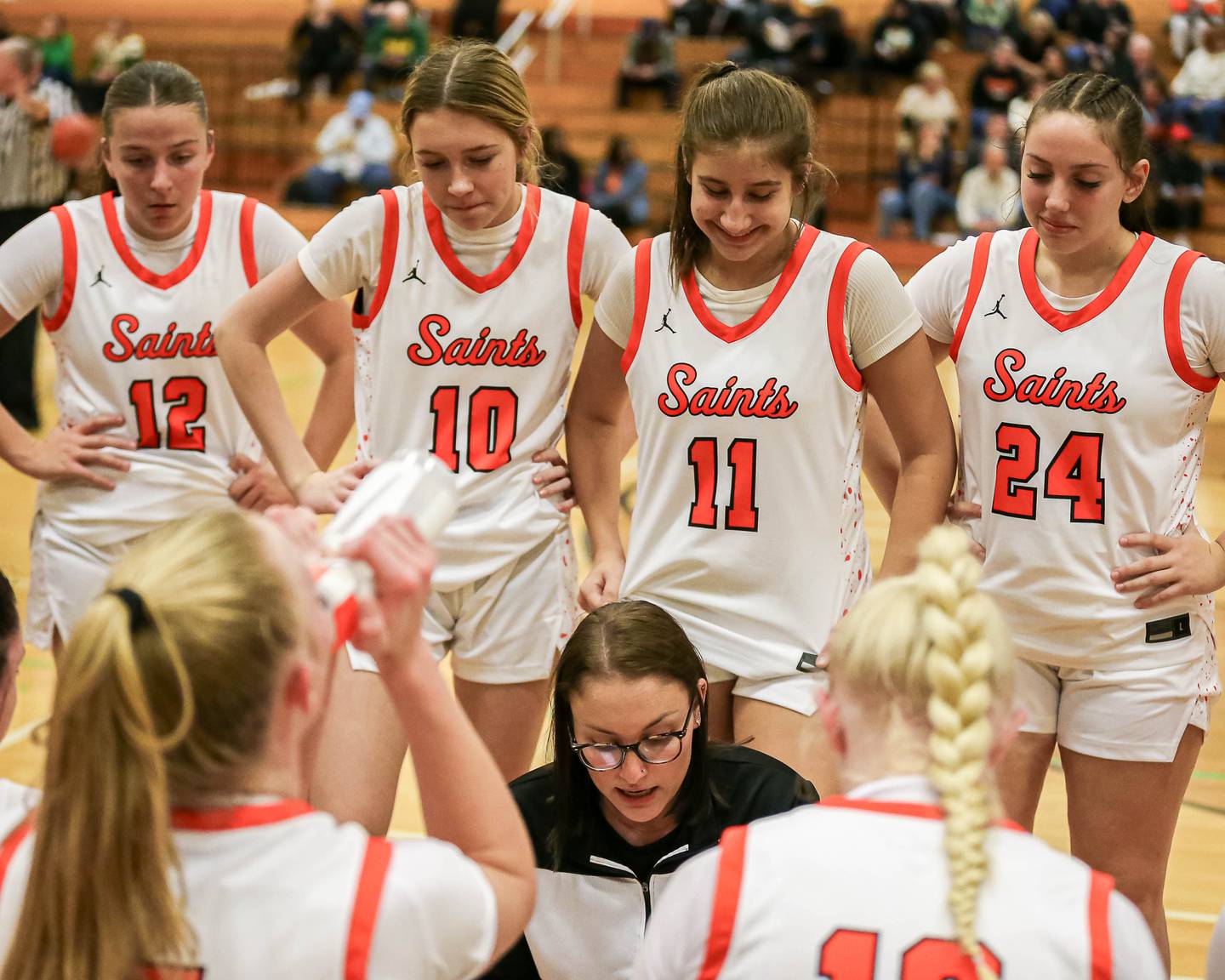 St Charles East's head coach Katie Claussner instructs the team during their York Thanksgiving Tournament game between St Charles East at Waubonsie Valley on Monday, Nov 18, 2024  in Elmurst.