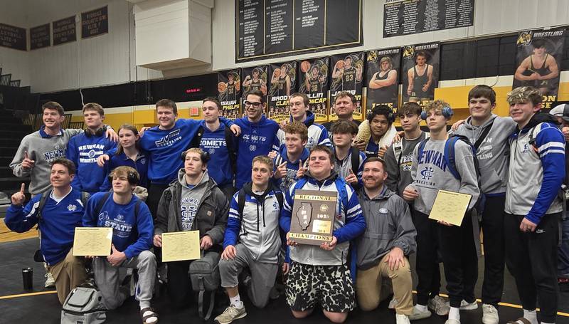 The Newman wrestling team is pictured after winning the Class 1A Riverdale Regional title on Saturday, Feb. 8, 2025.