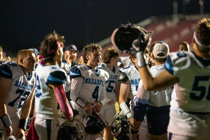 Nazareth Academy's Andrew Fowler (4) celebrates with his team after defeating Benet Academy to qualify for the state playoffs at Benedictine University in Lisle on Friday, Oct 21, 2022.