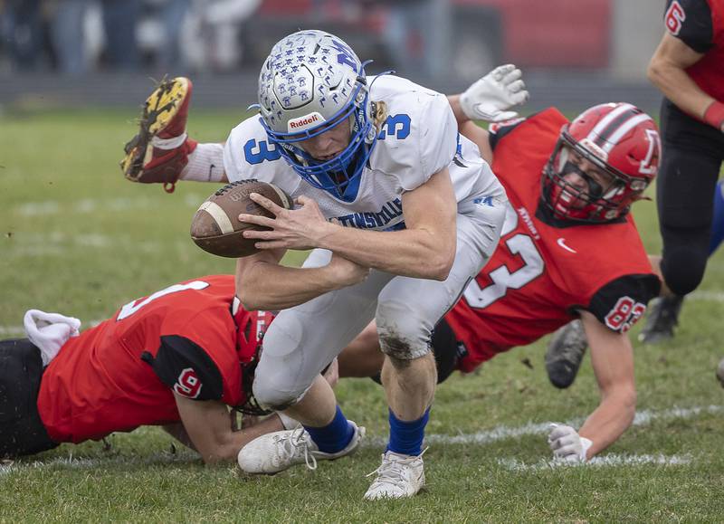 Martinsville’s Adam Parcel fumbles a ball against Amboy Saturday, Nov. 9, 2024, in round two of the 8-man football playoffs. The turnover was reversed as an official claimed his knee was down.