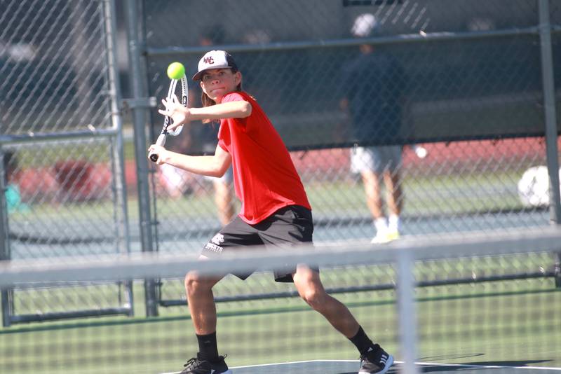 Lincoln-Way Central’s Jon Davis returns the ball during a doubles match with partner Trevor Braico (not pictured) in the state championship preliminaries at Buffalo Grove High School on Thursday, May 23, 2024.