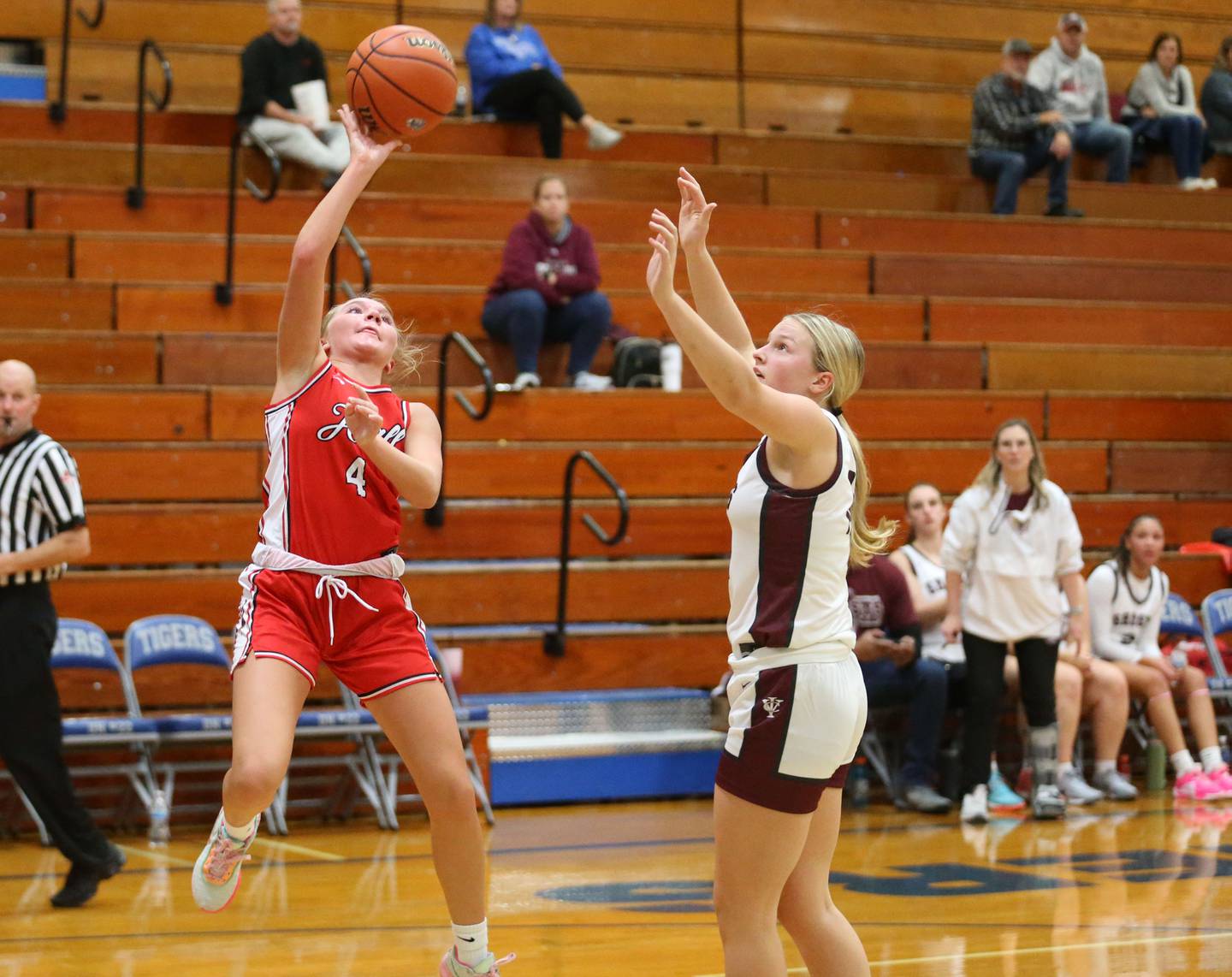 Hall's Charlie Pellegrini eyes the hoop while scoring on a layup over Illinois Valley Central's Kayt Miller during the Princeton Holiday Girls Basketball Tournament on Tuesday, Nov. 19, 2024 at Princeton High School.