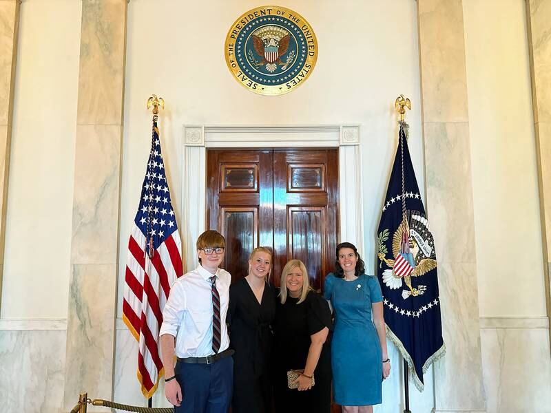 High school Spanish teacher and the 2022 Illinois Teacher of the Year Kimberly Radostits, right, was invited to an Aug. 26 back-to-school event at the White House in Washington, D.C. She brought with her Oregon Junior-Senior High School seniors Marcus Gilberto, left, and Nora Hammer, center-left, and OJSHS Assistant Principal Shannon Cremeens.