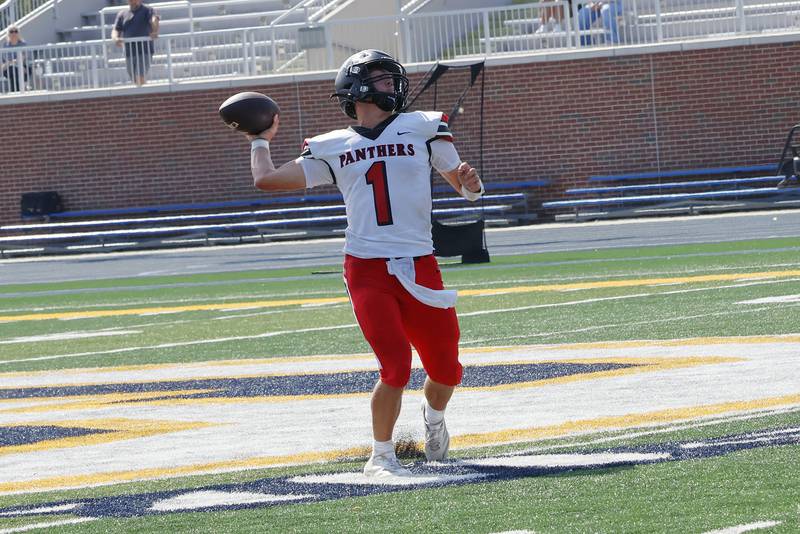 Erie-Prophetstown senior quarterback Keegan Winckler fires a rocket to the end zone to teammate Gaven Adams for EP's 2nd touchdown against the host team Newman Catholic on Saturday in Sterling.