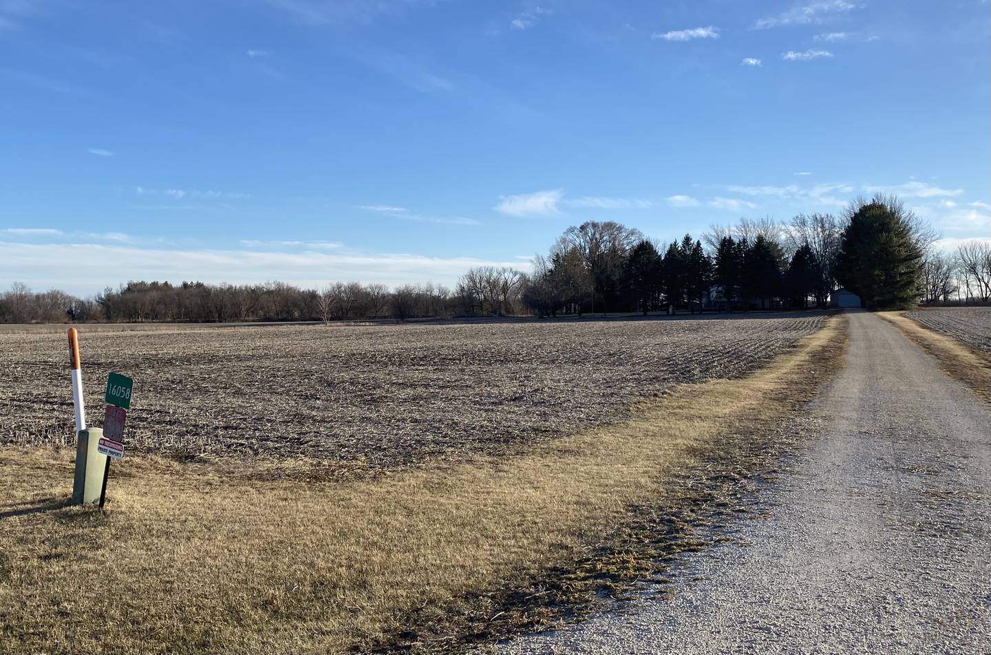 The long, winding driveway leads to the home of slain Sycamore mother and son, Patricia and Robert Wilson, at 16058 Old State Road. The home, shown here on Saturday, 18, 2025, has sat empty for nearly a decade, since the Wilsons were found beaten to death on Aug. 15, 2016.