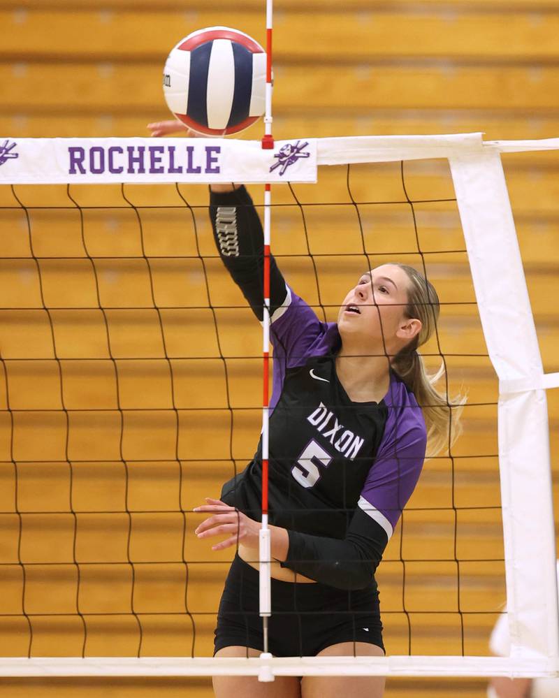 Dixon's Morgan Hargrave spikes the ball against Ottawa Tuesday, Oct. 28, 2025, during their Class 3A regional semifinal match at Rochelle High School.