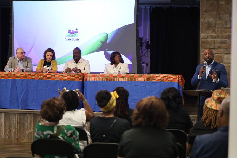 Dr. Levar J. Ammons, right, leads a panel on awareness and education at the Juneteenth event hosted by the Joliet Area Historical Museum on Monday, June 19, 2023 in Joliet.