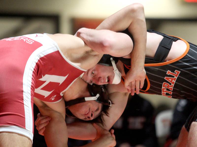 Crystal Lake Central’s  Brett Campagna, right, battles Huntley’s Vlad Maluhin in a 144-pound bout in varsity wrestling at Crystal Lake Friday. Campagna won the match.