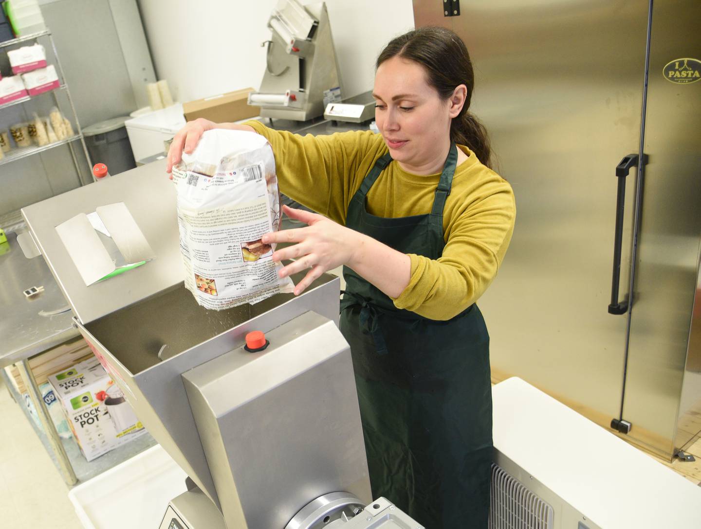 Lauren McLaughlin makes a batch of pasta in the kitchen at Ugly Noodle in Geneva.