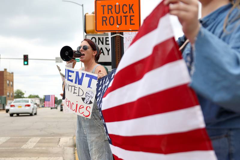Jen Marcotte, of St. Anne, participates in rally chants as approximately 500 people gathered at the Kankakee County Courthouse for a ‘No Kings’ rally in Kankakee on Saturday, June 14, 2025, to protest actions by President Donald Trump. Her sign reads "Prevent unwanted presidencies."