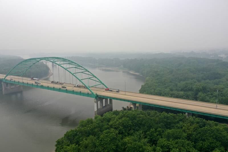Haze from the Canadian wildfires fills the Illinois River valley near the Abraham Lincoln Memorial Bridge on Interstate 39 on Tuesday, June 27, 2023 near La Salle.