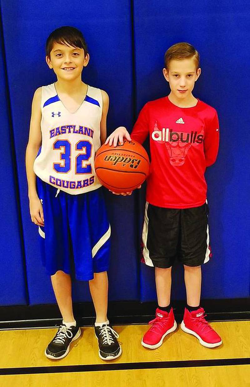 Shannon Knights of Columbus Council 12841 had a free throw contest Jan. 6 at Eastland Elementary School in Shannon, with 38 boys and girls competing. Adrian Martz (left), of Shannon, and Jalen Keim of Lanark tied and had a shoot-off, with Keim winning. He now can compete in the district contest in February in Freeport. Photo submitted by John Jirgenson.