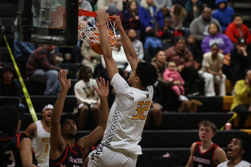Joliet West’s Ethan Hillsman throws down a dunk against Bolingbrook on Friday, Jan 24, 2025 in Joliet.