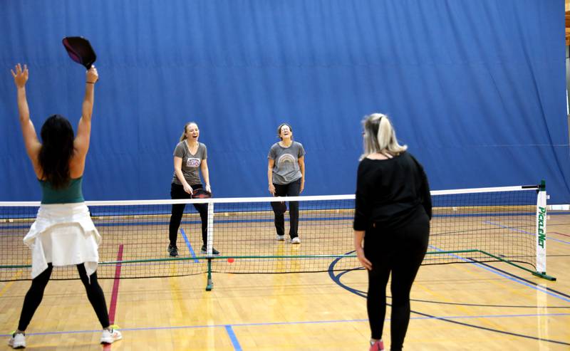 (From left) Joanna McKay, Katie Hernacki, Kate Gunderson and Kerrie Martin play pickle ball during an open gym session at the Stephen D. Persinger Recreation Center in Geneva on Jan. 12, 2023.
